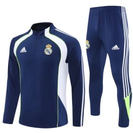 Real Madrid Trainingsanzüge 2025-26 - 1-4 Zip Blau Real Madrid Trainingsanzüge 2025-26 - 1-4 Zip Blau